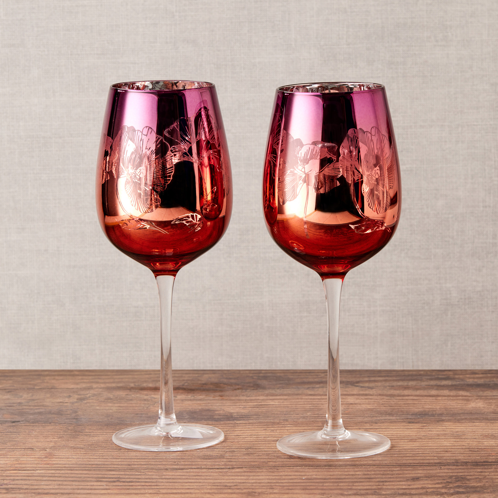 Visuel deLot de 2 verres à vin by Artland - Bloom Magnifiquement décorés avec un design détaillé rose, orange et argent, ces délicats verres à vin comportent un bouquet de fleurs miroir, le tout sur un grand bol incurvé, et une tige haute pour une élégance ultime